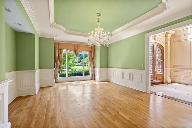 a kitchen with stainless steel appliances granite countertop a stove and a sink