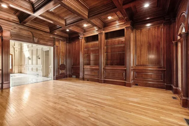 a view of livingroom with kitchen and fireplace