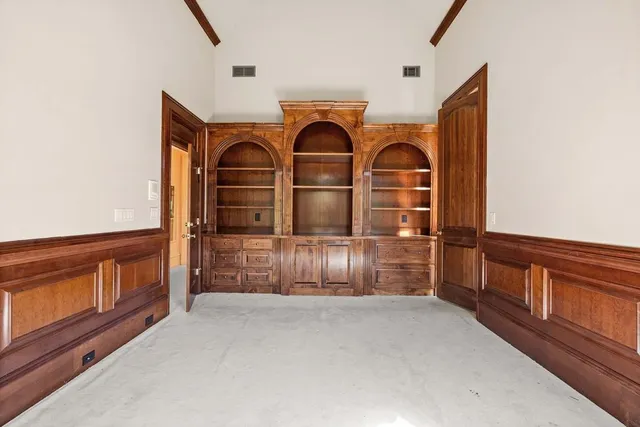 a bathroom with a tub and shower
