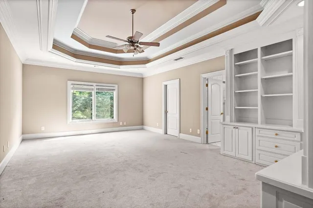 a view of a lake with a yard