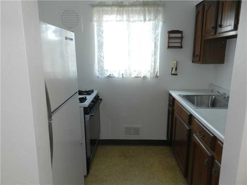 952 Agnew Road Baldwin, PA 15227 - Photo 3 of 11 Kitchen. Freshly painted kitchen with a window that lets in plenty of sunshine.
