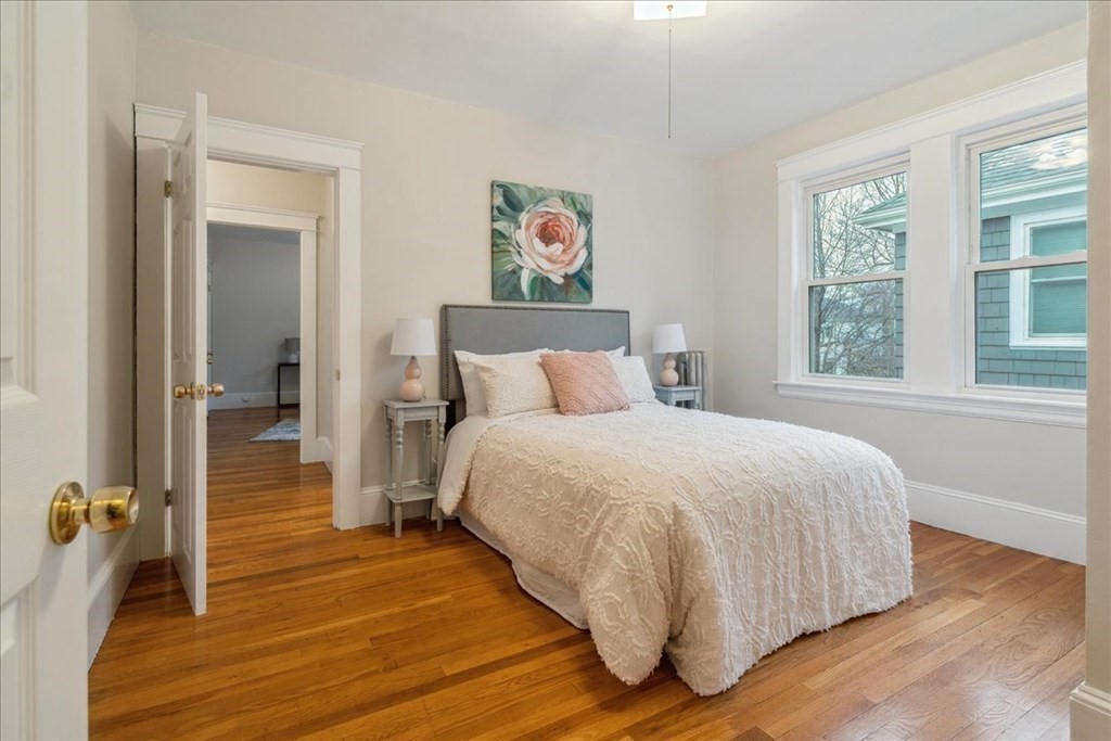 41 Blanchard Road, Unit 41 Cambridge, MA 02138 - Photo 12 of 36 a bedroom with a bed and a large window