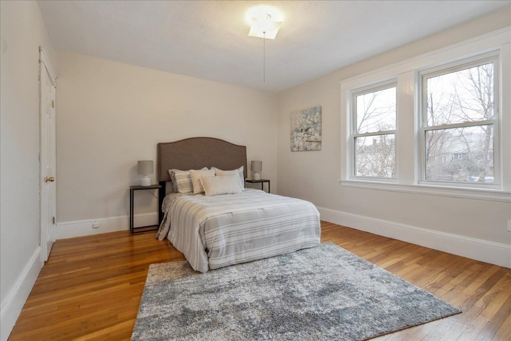 41 Blanchard Road, Unit 41 Cambridge, MA 02138 - Photo 14 of 36 a bedroom with a bed and window