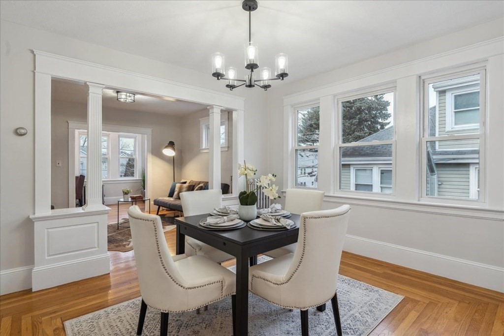 41 Blanchard Road, Unit 41 Cambridge, MA 02138 - Photo 2 of 36 a view of a dining room with furniture window and wooden floor