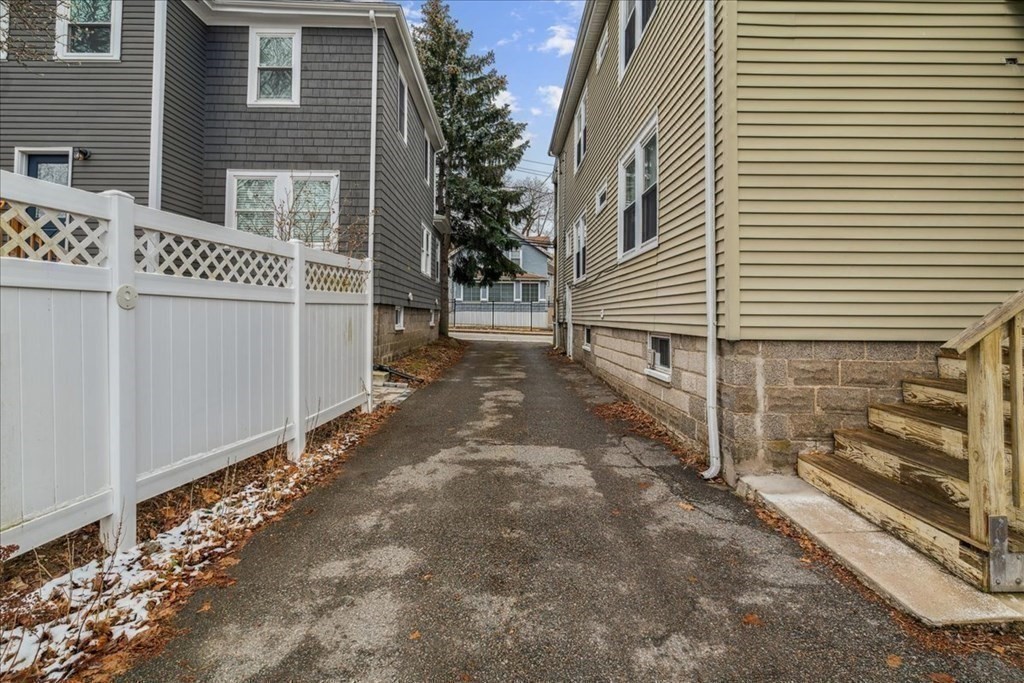 41 Blanchard Road, Unit 41 Cambridge, MA 02138 - Photo 21 of 36 a view of a house with a yard