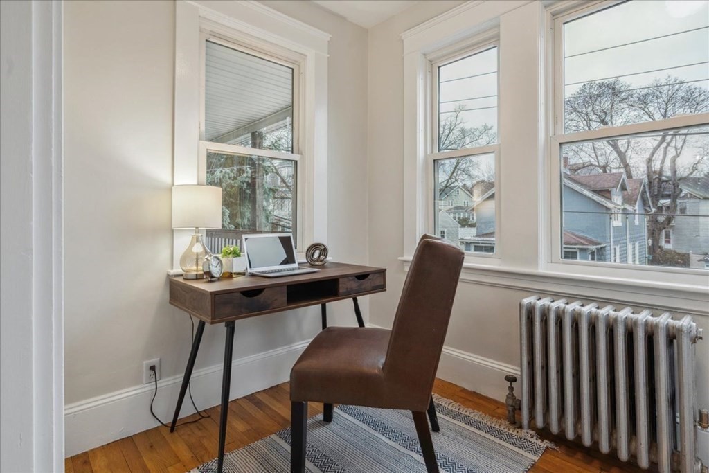 41 Blanchard Road, Unit 41 Cambridge, MA 02138 - Photo 5 of 36 a view of a dining room with furniture window and wooden floor