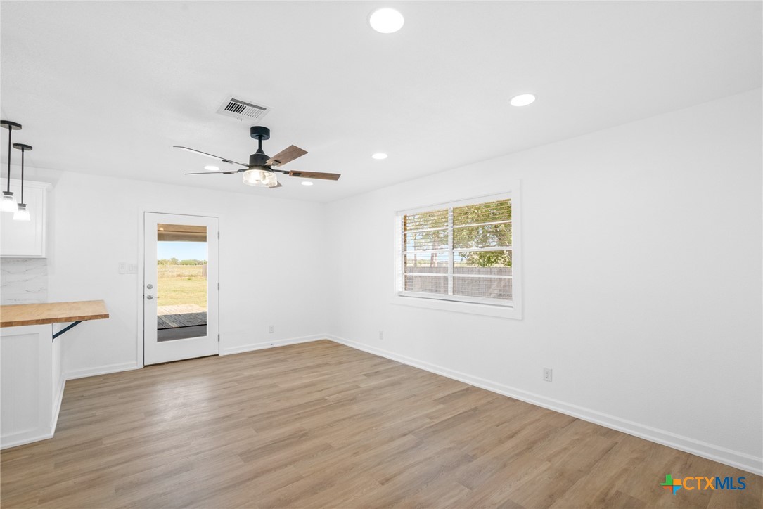 208 Eleanor Street Victoria, TX 77904 - Photo 21 of 40 a view of empty room with wooden floor and fan