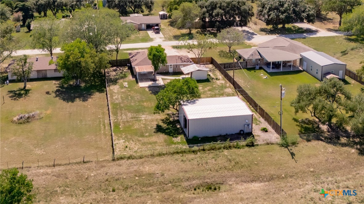 208 Eleanor Street Victoria, TX 77904 - Photo 39 of 40 an aerial view of a house with a yard and lake view