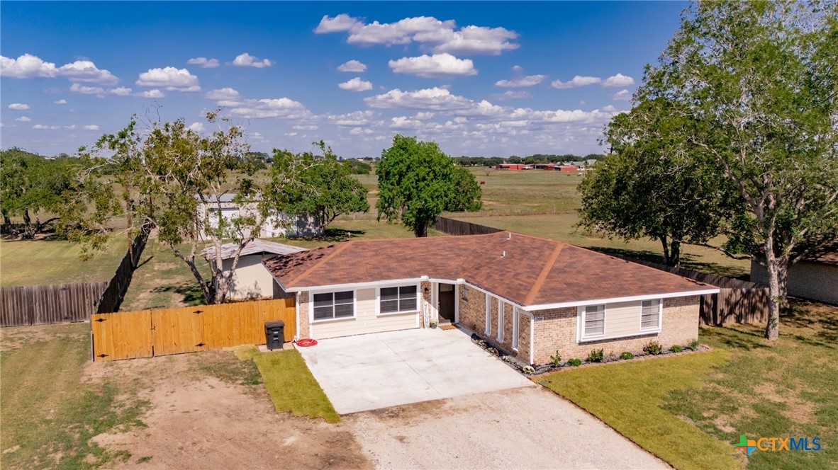 208 Eleanor Street Victoria, TX 77904 - Photo 40 of 40 a view of a big house with a big yard and large tree