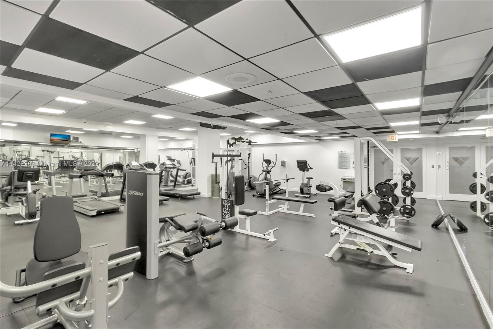 555 Northeast 15th Street, Unit 20B Miami, FL 33132 - Photo 27 of 33 a view of a room with gym equipment