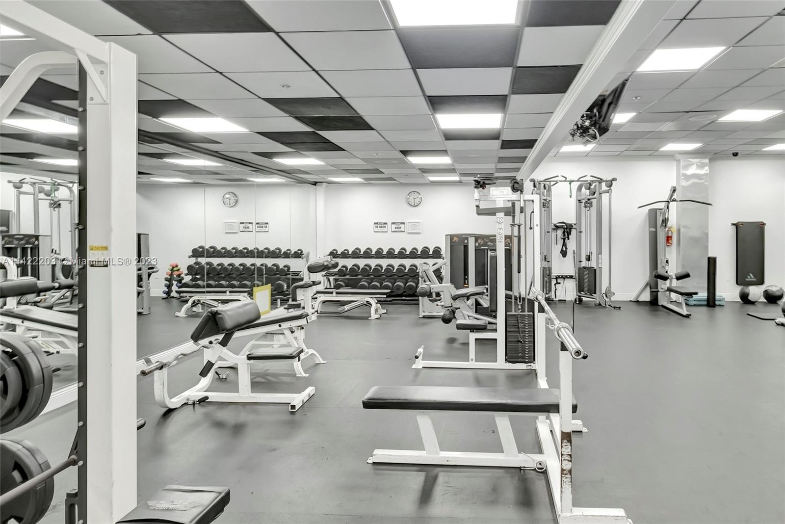 555 Northeast 15th Street, Unit 20B Miami, FL 33132 - Photo 28 of 33 a view of a room with gym equipment