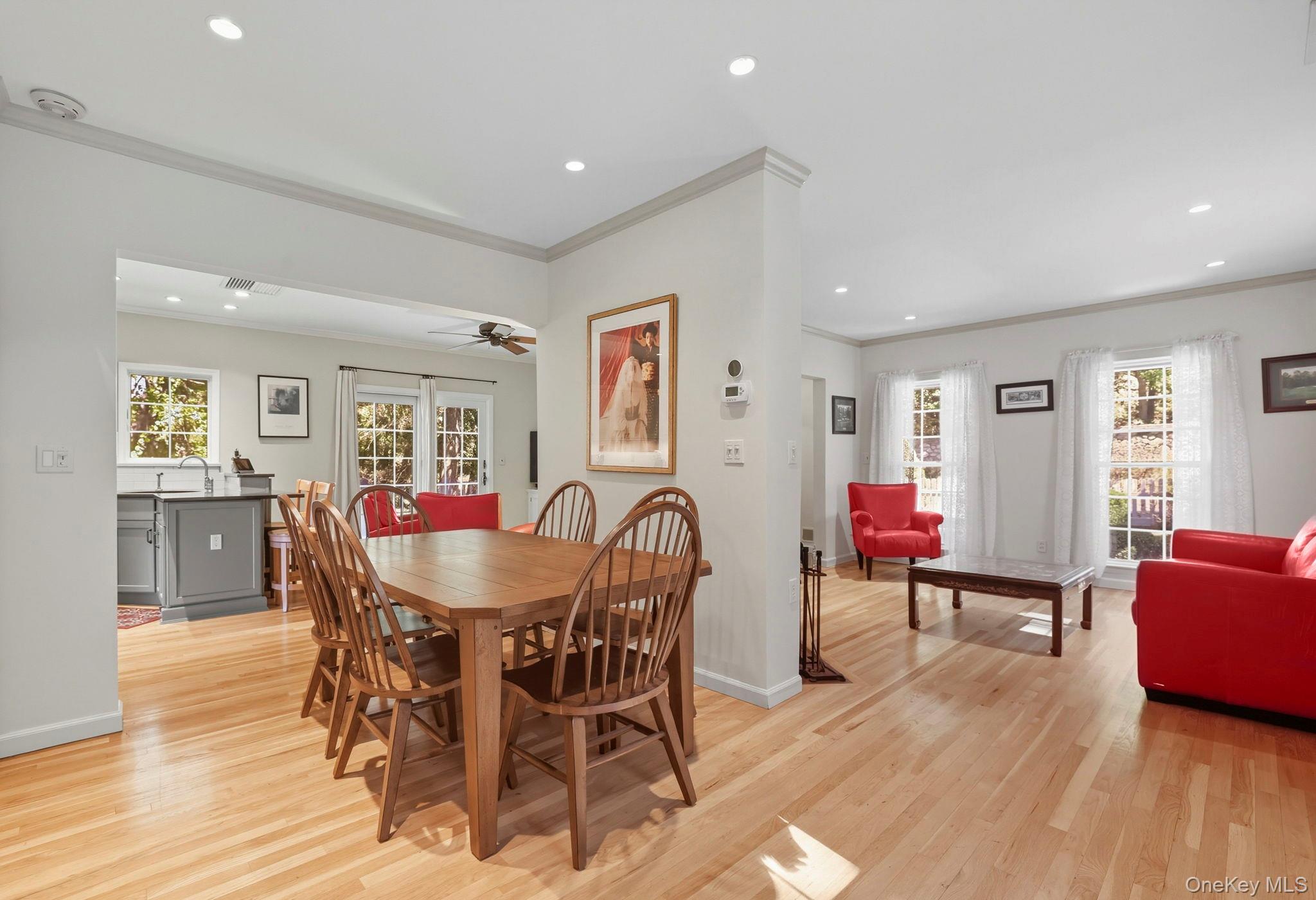 122 Harriman Road Mount Kisco, NY 10549 - Photo 17 of 39 a dining room with furniture and wooden floor