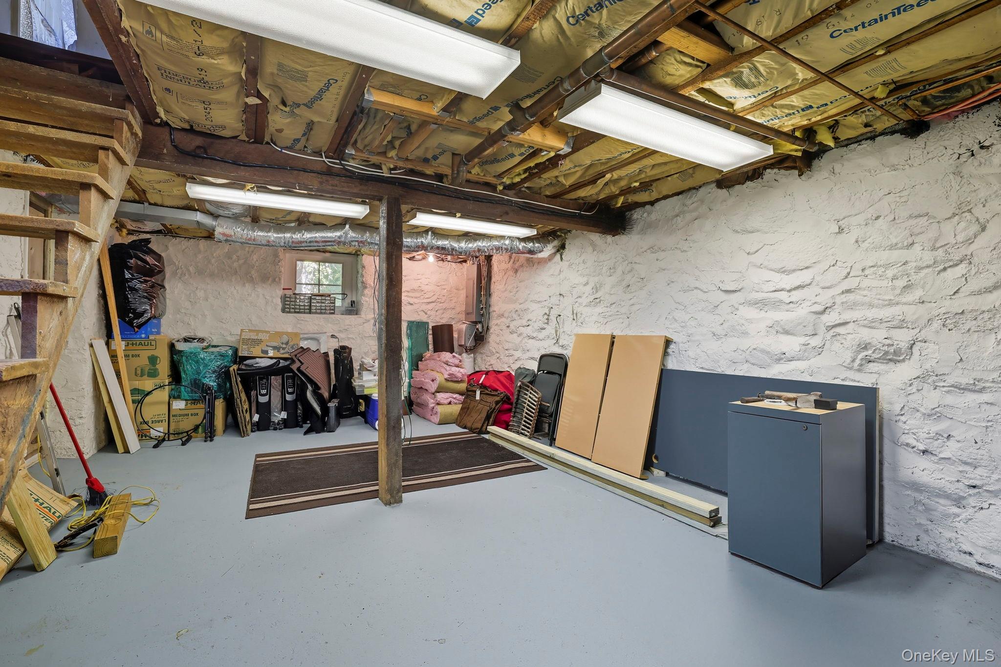 122 Harriman Road Mount Kisco, NY 10549 - Photo 29 of 39 a view of a room with gym equipment