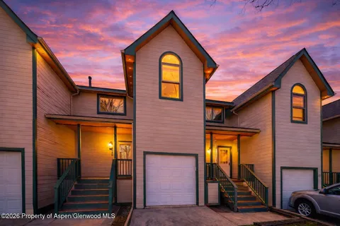 a view of a brick house with a windows