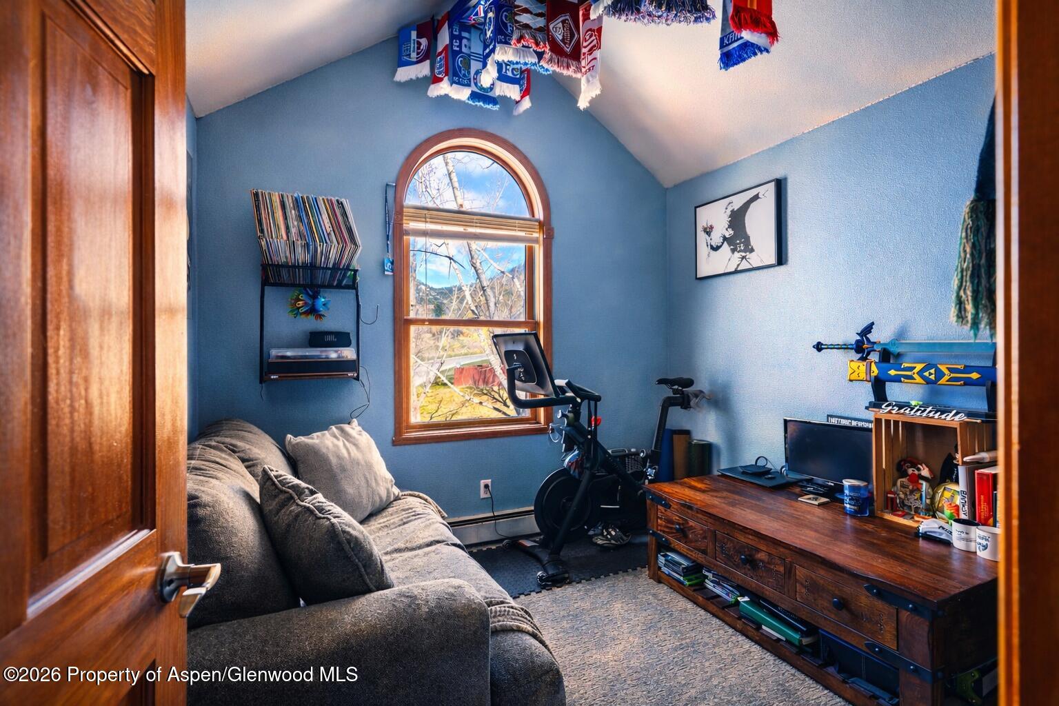 682 Alder Ridge Lane New Castle, CO 81647 - Photo 11 of 19 a livingroom with workspace and a window