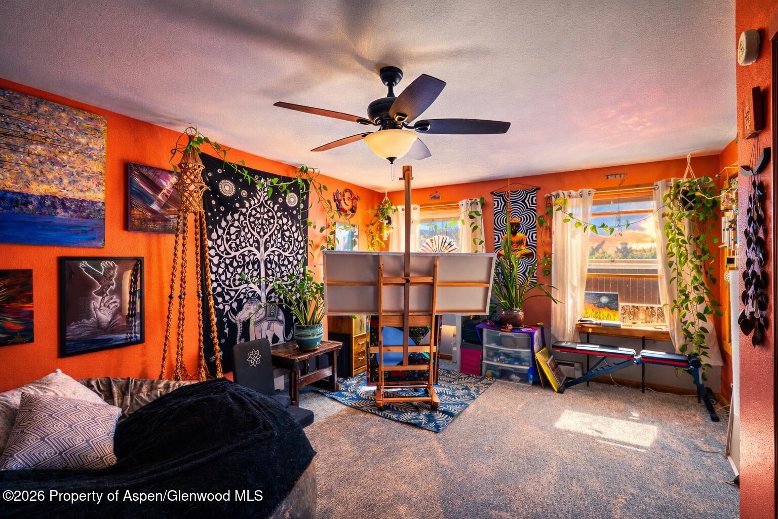 682 Alder Ridge Lane New Castle, CO 81647 - Photo 12 of 19 a view of a livingroom with furniture and a fan