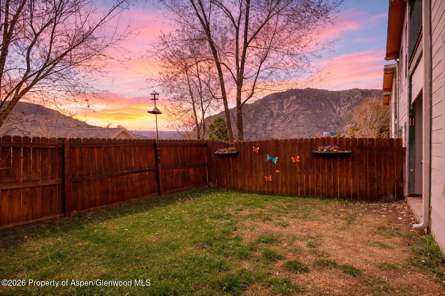 682 Alder Ridge Lane New Castle, CO 81647 - Photo 15 of 19 a view of a backyard with wooden fence
