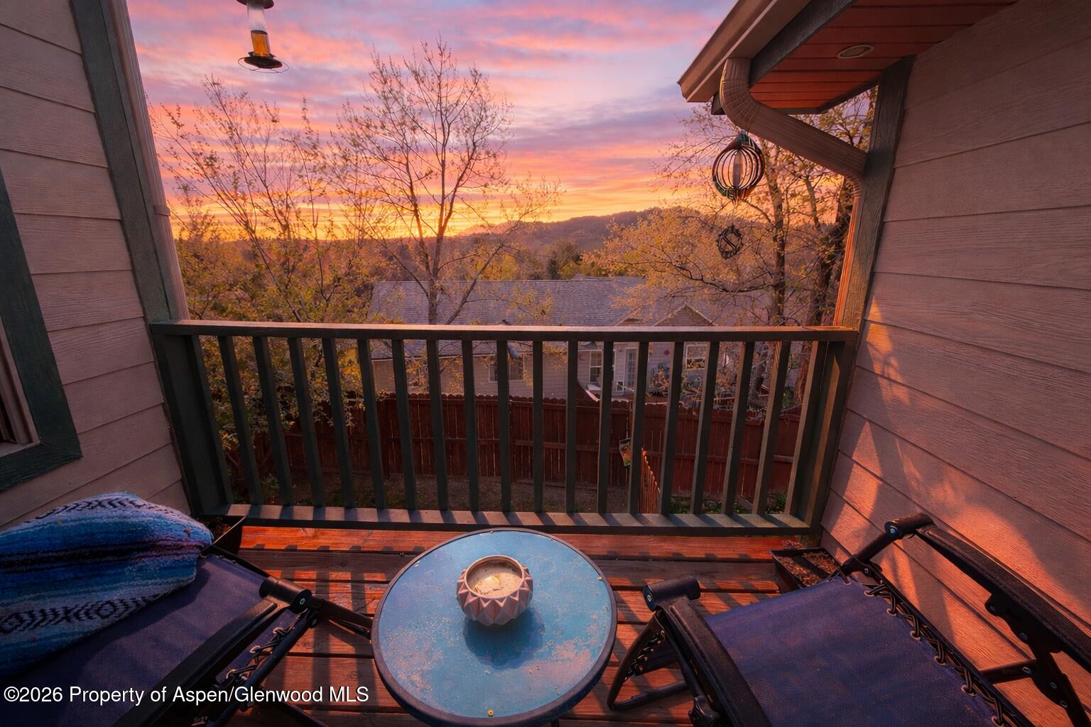 682 Alder Ridge Lane New Castle, CO 81647 - Photo 7 of 19 a view of a chairs and table in the patio