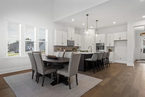 a view of a dining room with furniture