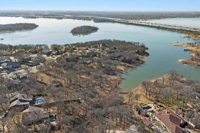 a backyard of a house with large trees