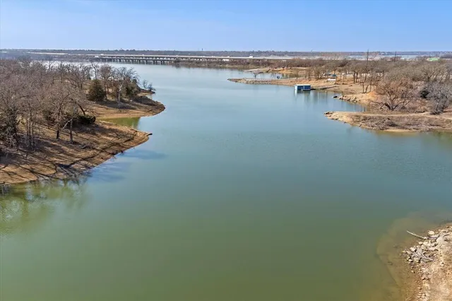 a view of lake with mountain in background