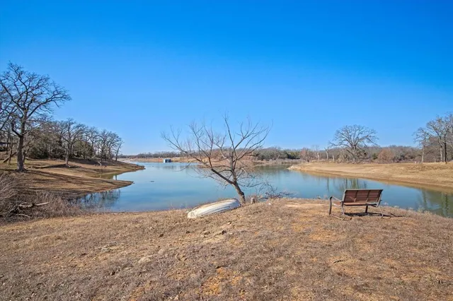 a view of yard covered with snow
