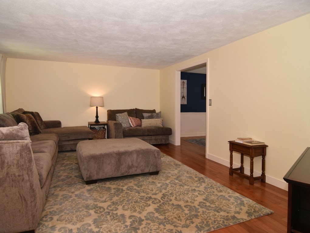 3 Violet Circle Milford, MA 01757 - Photo 16 of 41 a living room with couches and a coffee table