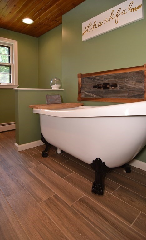 3 Violet Circle Milford, MA 01757 - Photo 19 of 41 a bathroom with a sink and a mirror