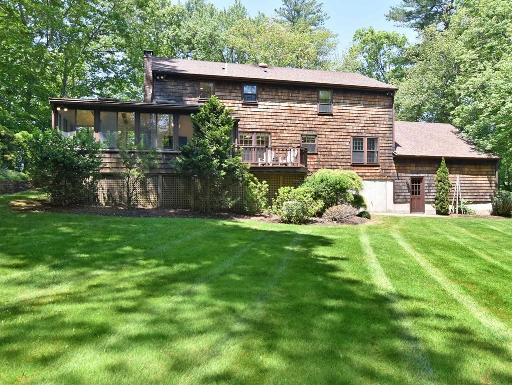3 Violet Circle Milford, MA 01757 - Photo 2 of 41 a front view of a house with garden