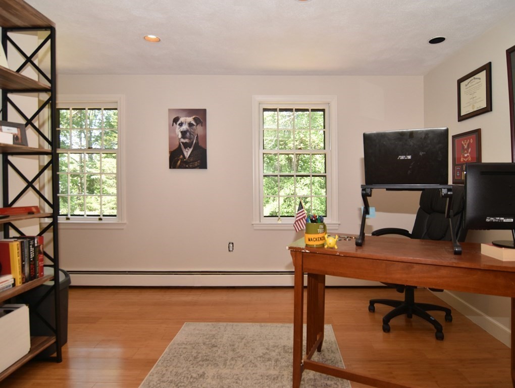3 Violet Circle Milford, MA 01757 - Photo 22 of 41 a view of a workspace with furniture and a window