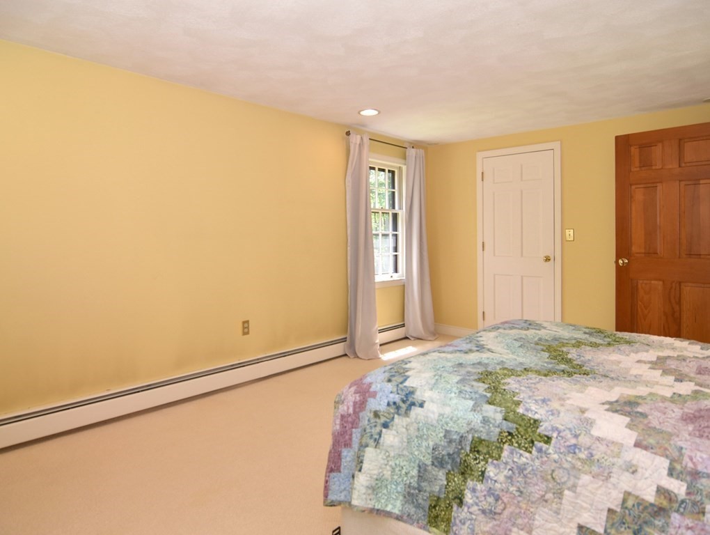 3 Violet Circle Milford, MA 01757 - Photo 24 of 41 a view of a livingroom with wooden floor and closet