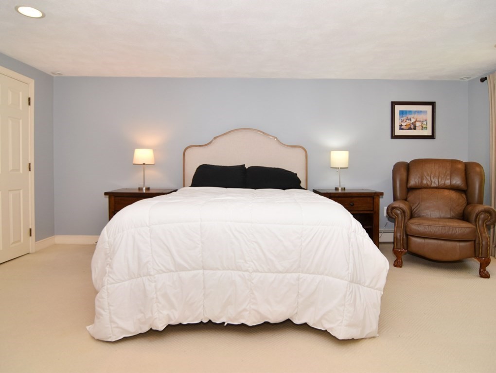 3 Violet Circle Milford, MA 01757 - Photo 30 of 41 a bed room with a bed and a couch
