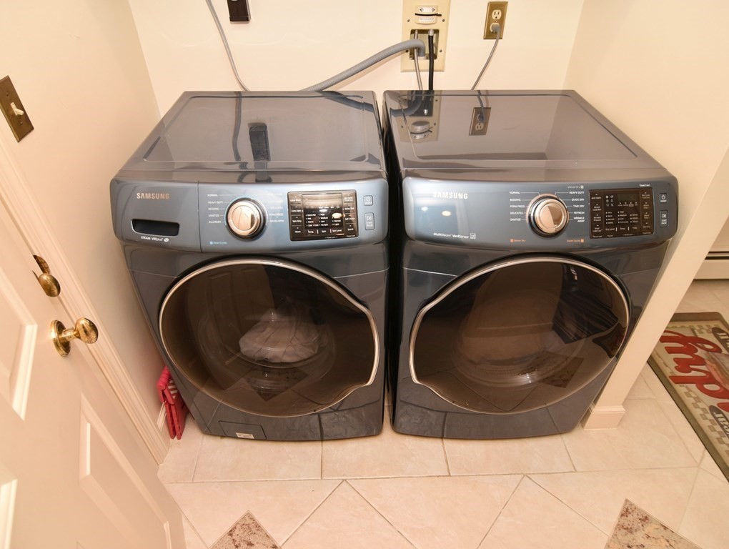 3 Violet Circle Milford, MA 01757 - Photo 34 of 41 a utility room with dryer and washer