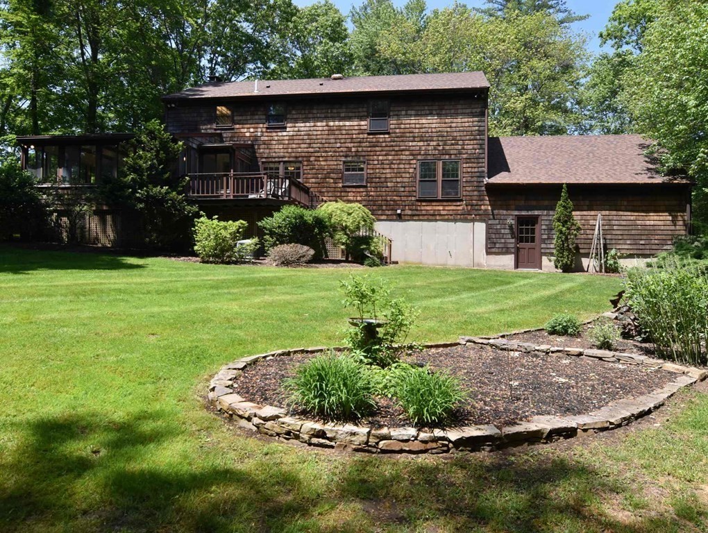 3 Violet Circle Milford, MA 01757 - Photo 36 of 41 a view of a back yard of the house