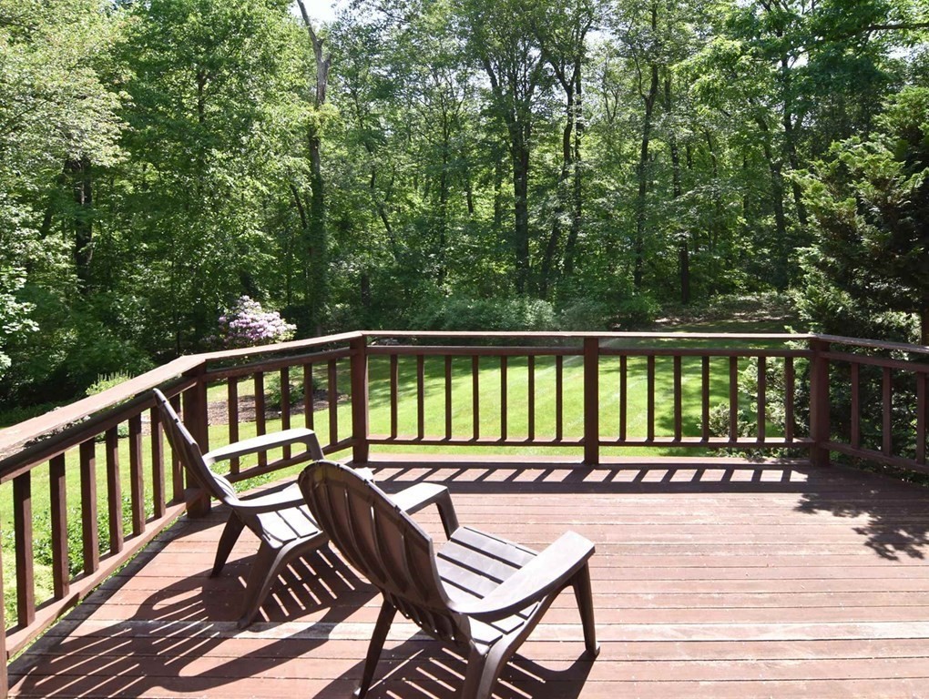 3 Violet Circle Milford, MA 01757 - Photo 39 of 41 a view of a wooden deck with furniture