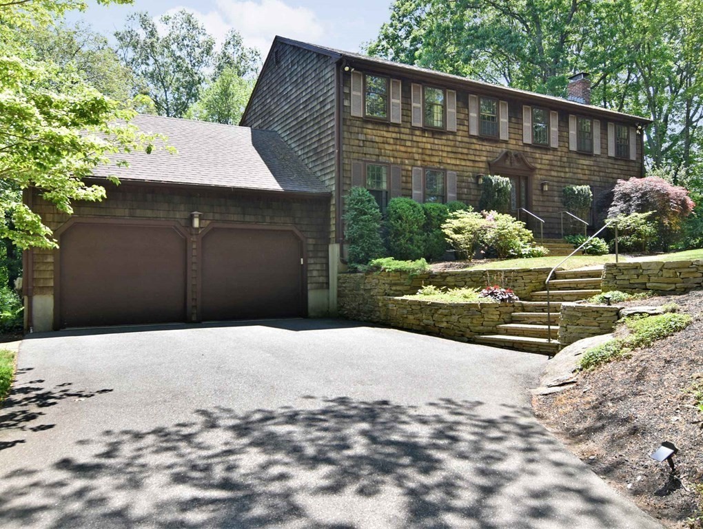 3 Violet Circle Milford, MA 01757 - Photo 40 of 41 a front view of a house with a yard