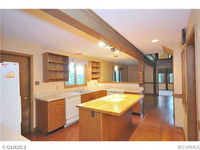2100 Maidens Road Maidens, VA 23102 - Photo 8 of 24 a kitchen with a sink and cabinets