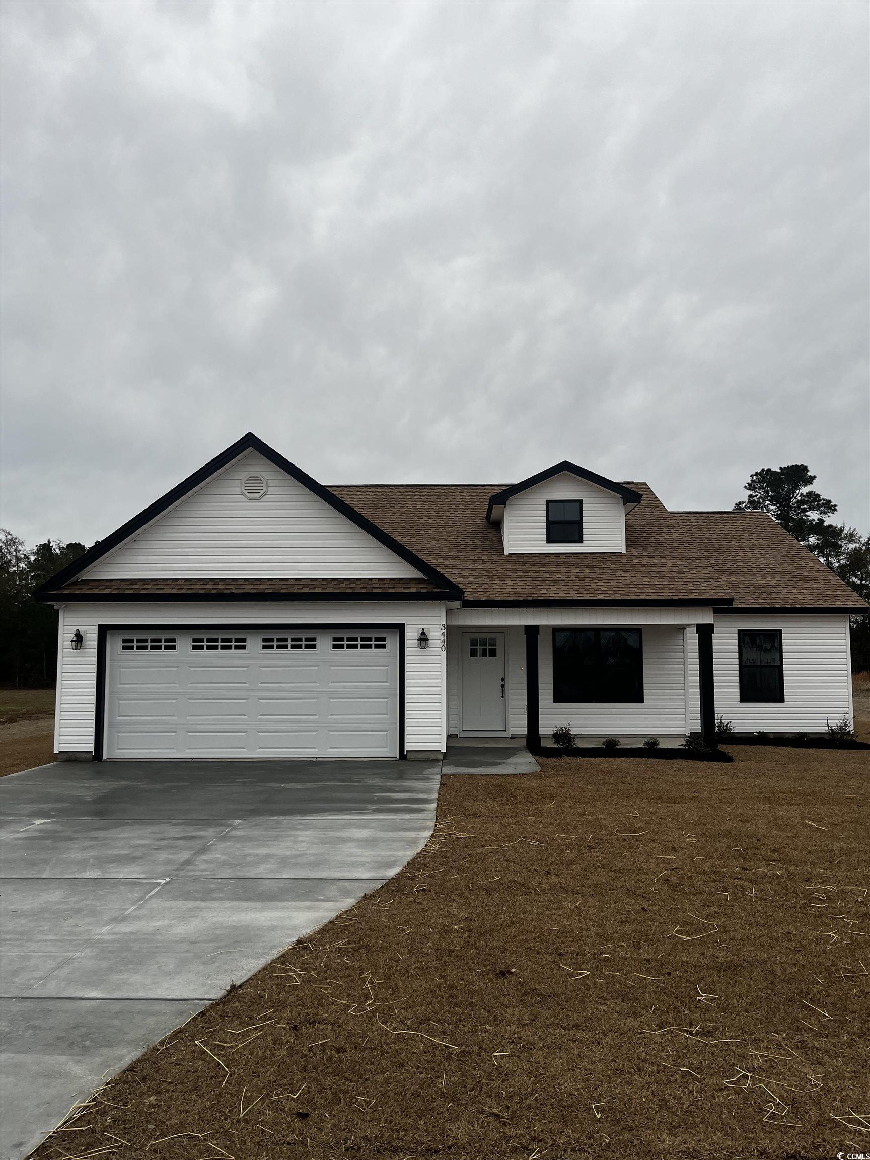 Ranch-style house with covered porch, a shingled roof, concrete driveway, and an attached garage