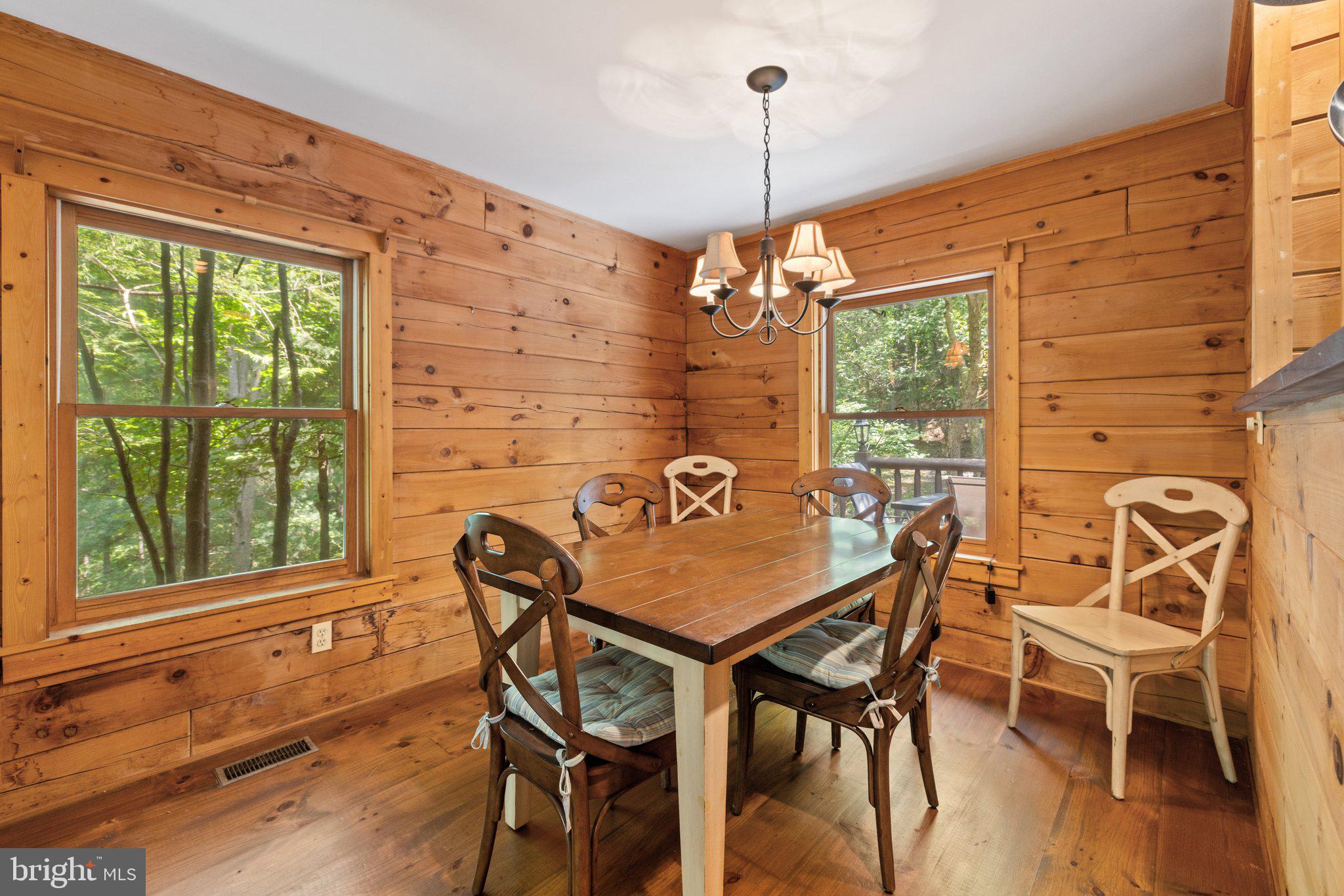 47 Gore Road Castleton, VA 22716 - Photo 6 of 46 a view of a dining room with furniture window and outside view
