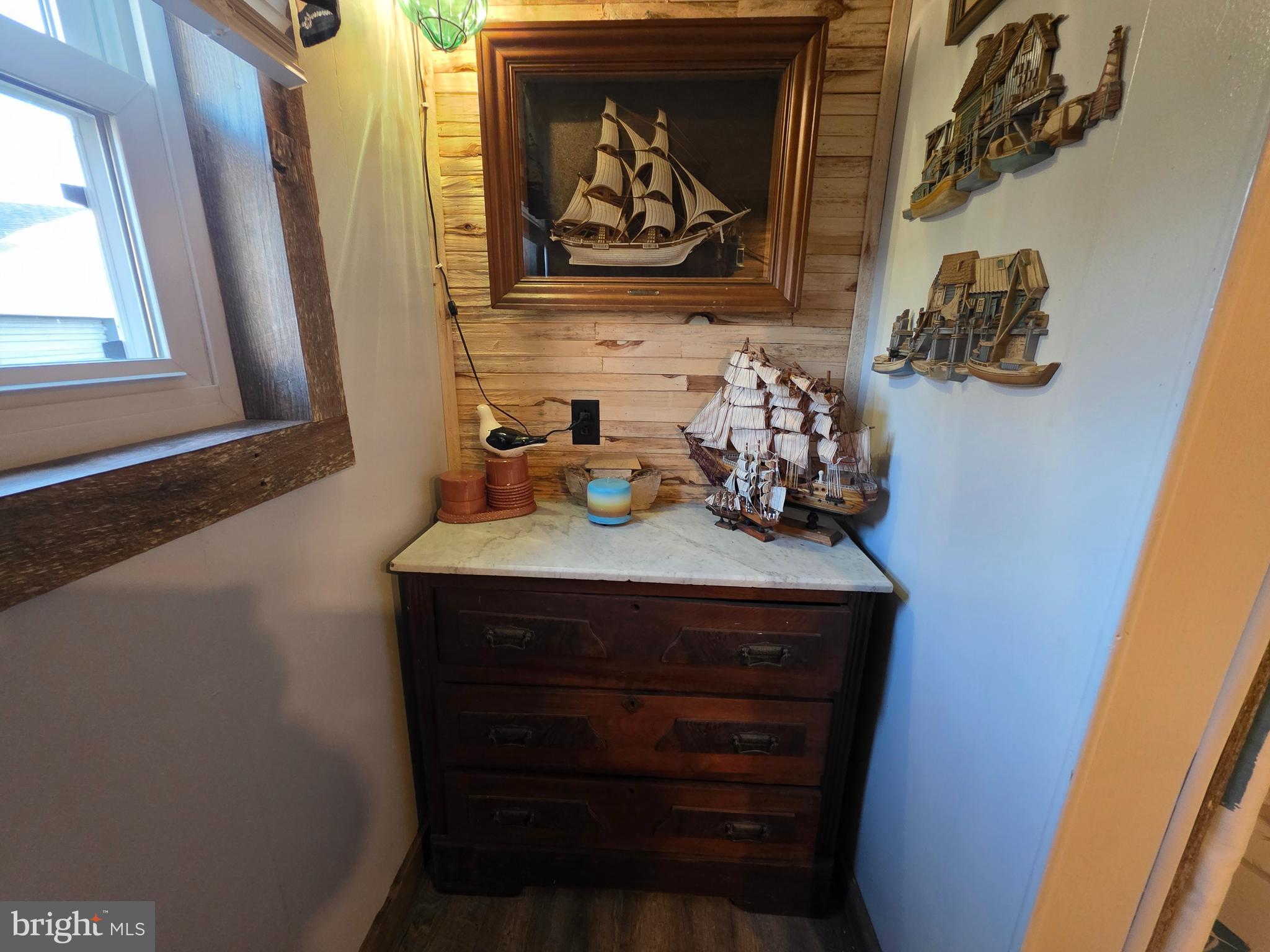 21 Vassar Avenue Fortescue, NJ 08321 - Photo 28 of 44 a bathroom with a sink and a mirror