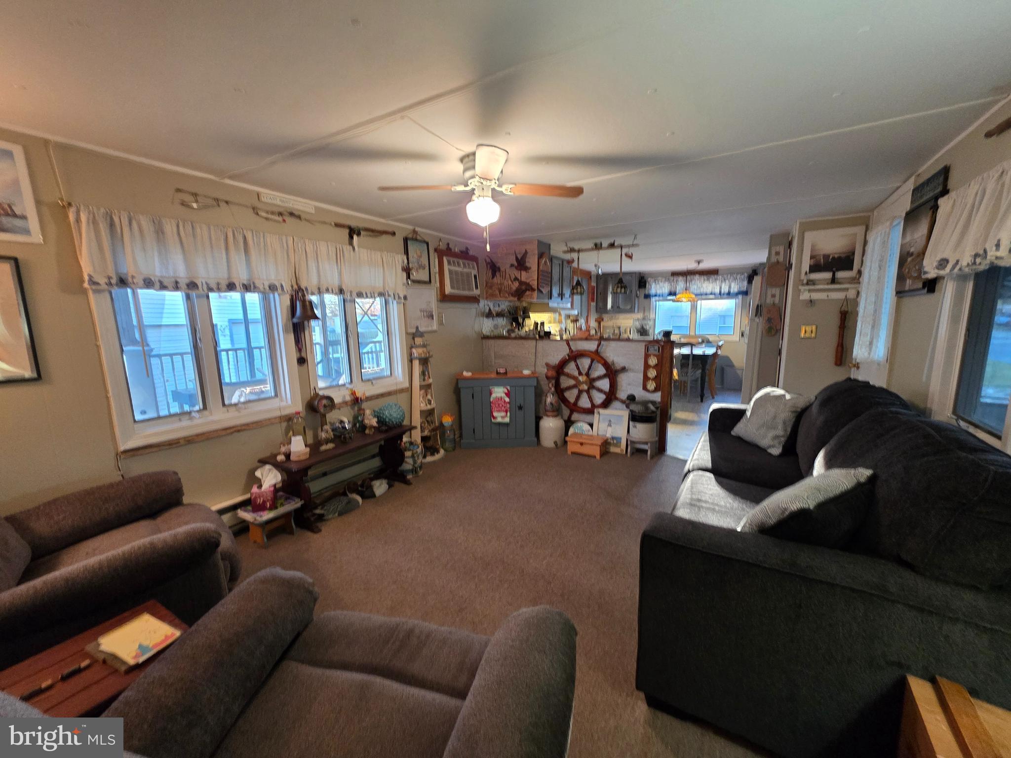 21 Vassar Avenue Fortescue, NJ 08321 - Photo 8 of 44 a living room with furniture a window and gym equipment