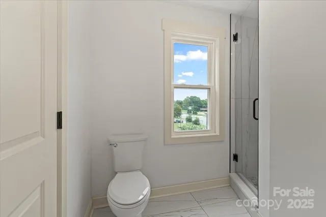 a bathroom with a toilet