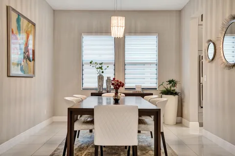 a workspace with furniture and a potted plant