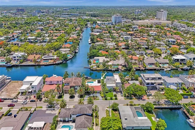 an aerial view of a houses with outdoor space