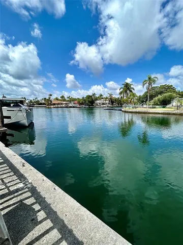 a view of a lake from a yard