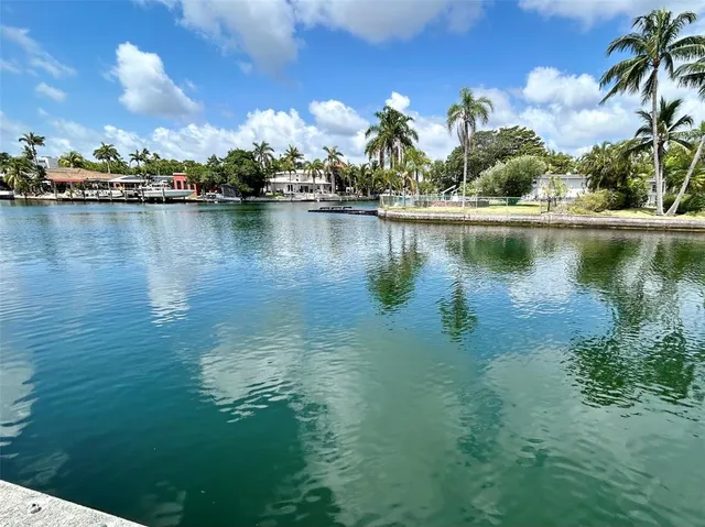 a view of a lake with houses