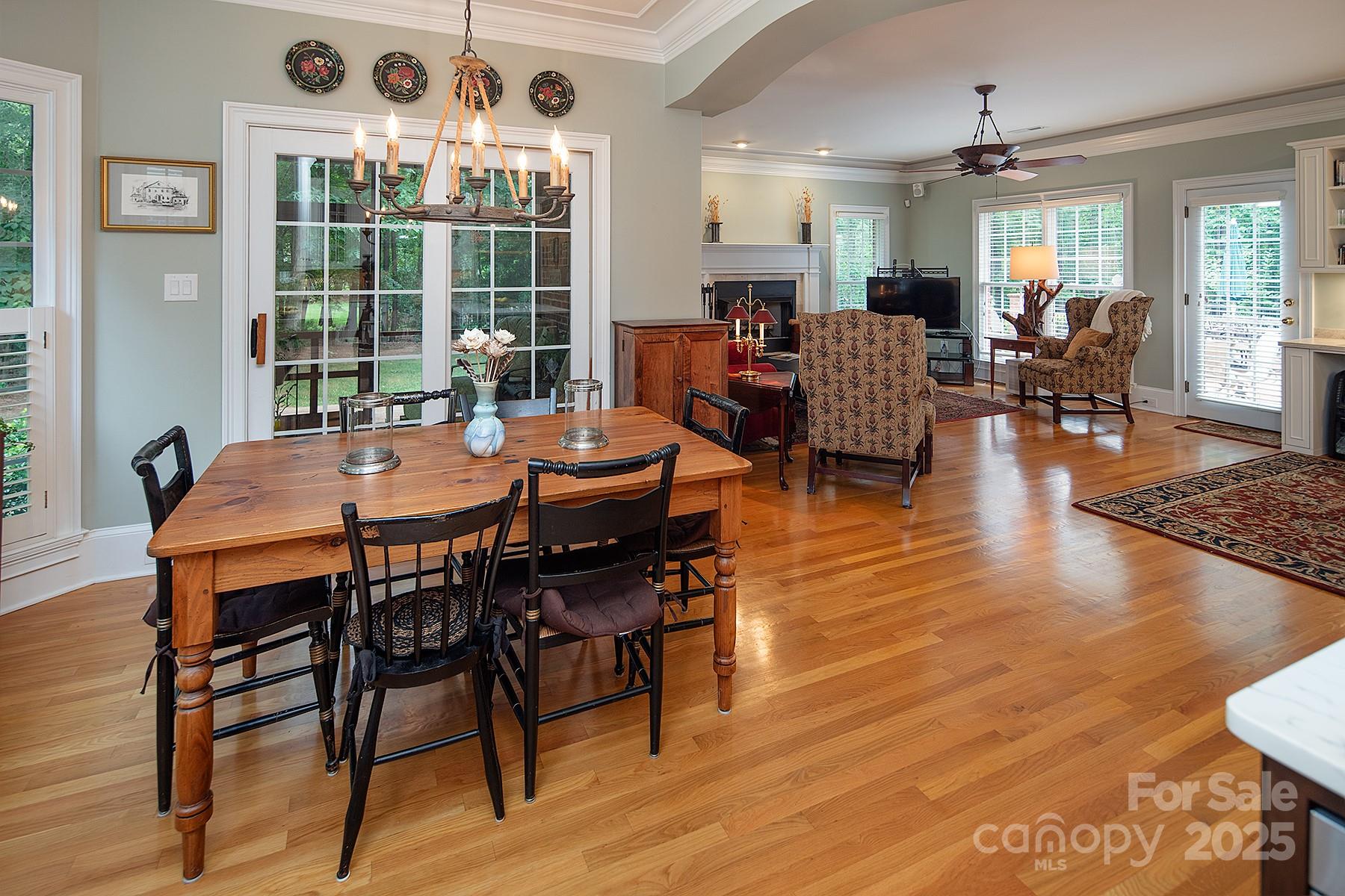 3504 High Ridge Road Charlotte, NC 28270 - Photo 14 of 36 a view of a dining room with furniture window and wooden floor