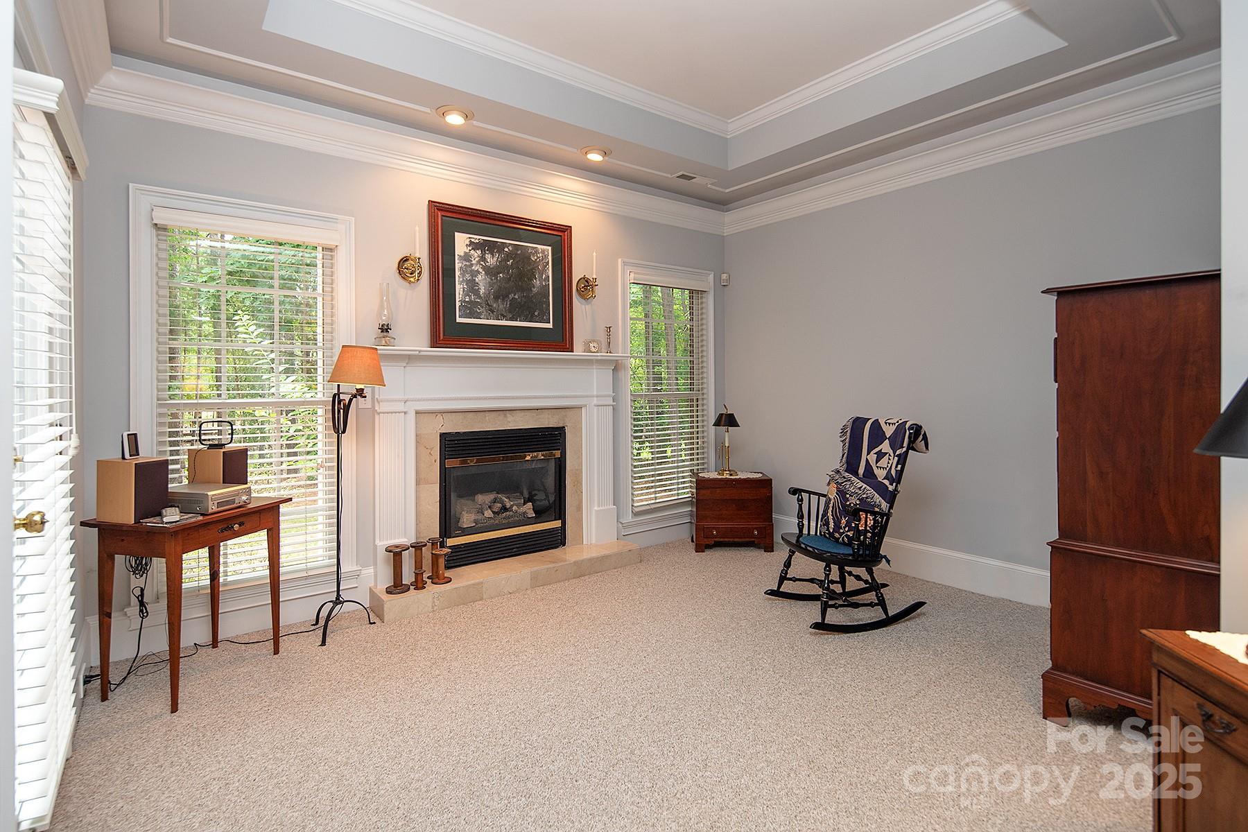 3504 High Ridge Road Charlotte, NC 28270 - Photo 17 of 36 a view of a livingroom with furniture and a fireplace