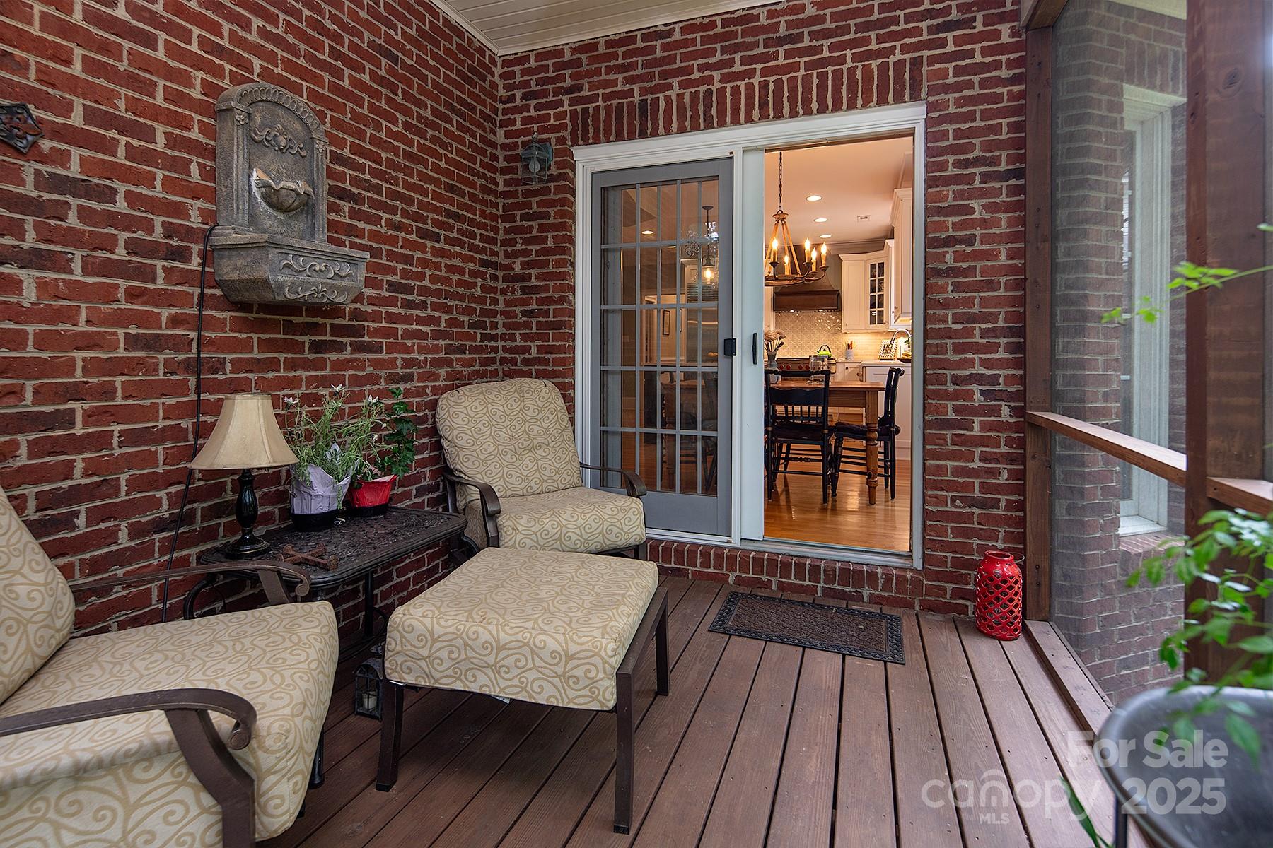 3504 High Ridge Road Charlotte, NC 28270 - Photo 29 of 36 a view of a balcony with chairs and wooden floor