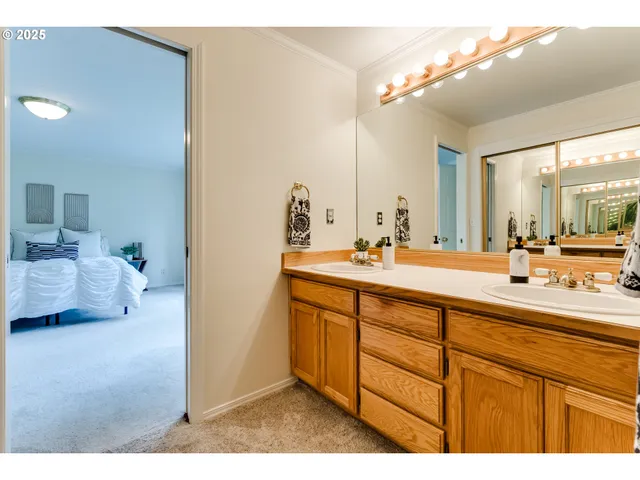 a bathroom with a sink and mirror